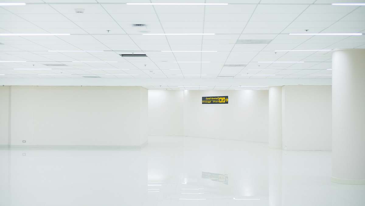 don mueang international airport photo of white tiled room thailand